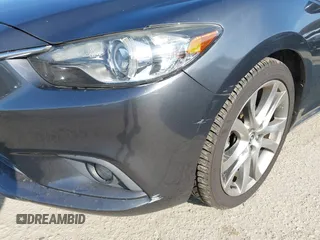 2015 Mazda 6 i Grand Touring with VIN JM1GJ1W55F1220578, listed as a IAAI auction lot 42076034 with 77,904 mi miles and . Bid and sale history available at carsss.com. Image 17.