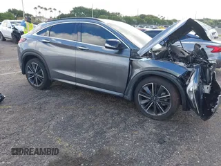2023 Infiniti QX55 Luxe z VIN 3PCAJ5JR3PF106482, wystawiony jako IAAI lot #40831385 z przebiegiem 33 013 mil mil oraz . Historia ofert i sprzedaży dostępna na DreamBid. Obrazek 1.