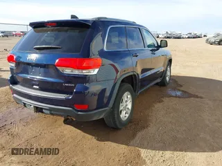2014 Jeep Grand Cherokee Laredo with VIN 1C4RJEAGXEC206879, listed as a IAAI auction lot 41073934 with 160,457 mi miles. Bid and sale history available at carsss.com. Image 4.