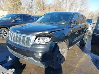2011 Jeep Grand Cherokee 70th Anniversary with VIN 1J4RR4GT8BC504618, listed as a IAAI auction lot 40993960 with 188,098 mi miles. Bid and sale history available at carsss.com. Image 17.