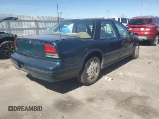 1997 Oldsmobile Cutlass Supreme S z VIN 1G3WH52M7VF349340, wystawiony jako Copart lot #50806565 z przebiegiem 1 254 585 mil mil oraz Szkody całkowita. Historia ofert i sprzedaży dostępna na DreamBid. Obrazek 3.