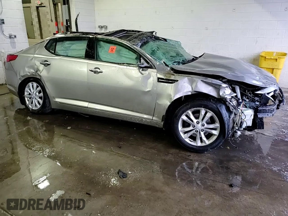2013 Kia Optima EX с VIN 5XXGN4A70DG239393, выставлен на аукционе Copart как лот 41923615 с пробегом Не указан миль и Списание • Salvage title. История ставок и продаж доступна на DreamBid. Изображение 13.