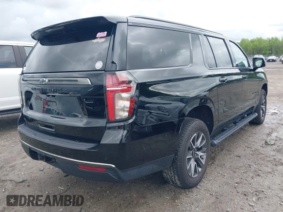2022 Chevrolet Suburban Z71 with VIN 1GNSKDKD7NR345224, listed as a IAAI auction lot 42007246 with 50,300 mi miles and . Bid and sale history available at DreamBid. Image 4.