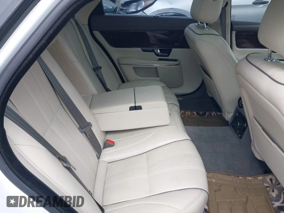 2013 Jaguar XJ Portfolio with VIN SAJWJ2GD3D8V48238, listed as a IAAI auction lot 40435160 with 136,738 mi miles and . Bid and sale history available at DreamBid. Image 8.