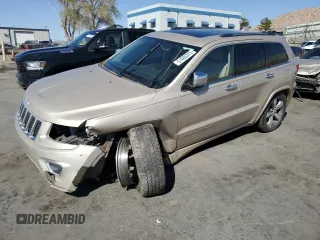 2015 Jeep Grand Cherokee Overland with VIN 1C4RJFCT5FC913728, listed as a Copart auction lot 51605375 with 180,452 mi miles and Salvage Title. Bid and sale history available at carsss.com. Image 1.
