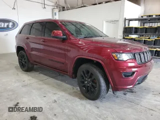 2018 Jeep Grand Cherokee Laredo E with VIN 1C4RJFAGXJC137479, listed as a Copart auction lot 55839395 with 102,612 mi miles and Clean Title. Bid and sale history available at DreamBid. Image 4.