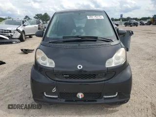 2009 Smart fortwo Pure z VIN WMEEJ31XX9K269982, wystawiony jako Copart lot #59214215 z przebiegiem 99 711 mil mil oraz Tytuł czysty. Historia ofert i sprzedaży dostępna na DreamBid. Obrazek 5.