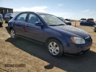 2006 Kia Spectra EX with VIN KNAFE121965253446, listed as a Copart auction lot 53084675 with 195,488 mi miles and Salvage Title. Bid and sale history available at DreamBid. Image 4.