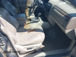 2000 Jeep Grand Cherokee Laredo with VIN 1J4G248S1YC416634, listed as a IAAI auction lot 42036197 with 140,596 mi miles and . Bid and sale history available at DreamBid. Image 5.