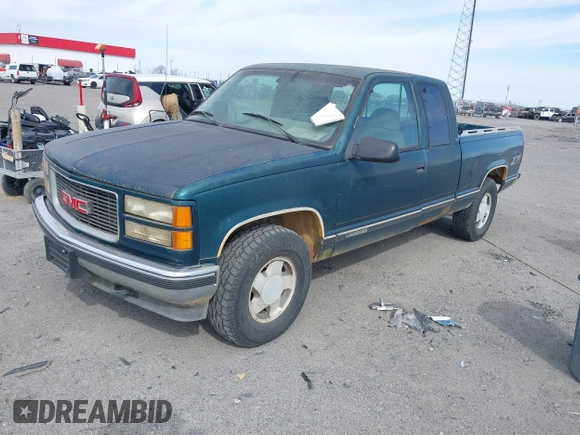 1995 GMC Sierra 1500 z VIN 2GTEK19K1S1520208, wystawiony jako IAAI lot #41835713 z przebiegiem 190 832 mil mil oraz . Historia ofert i sprzedaży dostępna na DreamBid. Obrazek 2.