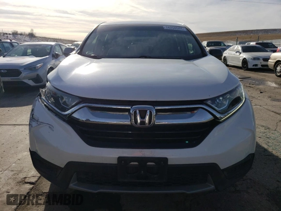2019 Honda CR-V LX with VIN 2HKRW6H3XKH227693, listed as a Copart auction lot 74258544 with 54,928 mi miles and Salvage Title. Bid and sale history available at carsss.com. Image 5.