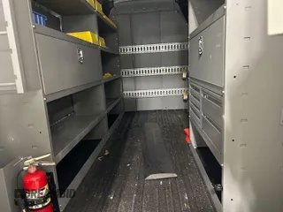 2023 Ford Transit Cargo with VIN 1FTBR1X81PKA75434, listed as a IAAI auction lot 42742887 with 5,111 mi miles and . Bid and sale history available at DreamBid. Image 10.
