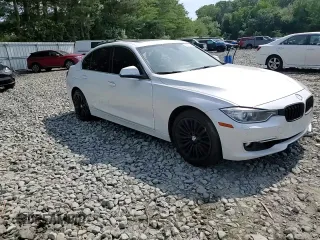 2015 BMW 3 Series 328i xDrive with VIN WBA3B3G52FNT19323, listed as a Copart auction lot 61873015 with 110,893 mi miles and Salvage title. Bid and sale history available at DreamBid. Image 13.