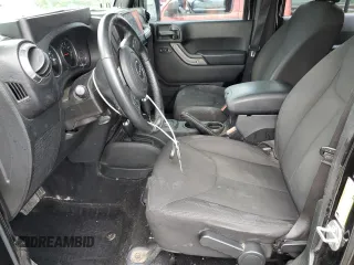 2017 Jeep Wrangler Unlimited Sport with VIN 1C4BJWDG3HL738241, listed as a Copart auction lot 60310865 with 113,526 mi miles and Salvage title. Bid and sale history available at DreamBid. Image 7.