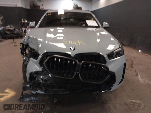 2025 BMW X6 xDrive40i with VIN 5UX33EX04S9Z44291, listed as a IAAI auction lot 41827897 with 1,053 mi miles. Bid and sale history available at carsss.com. Image 12.