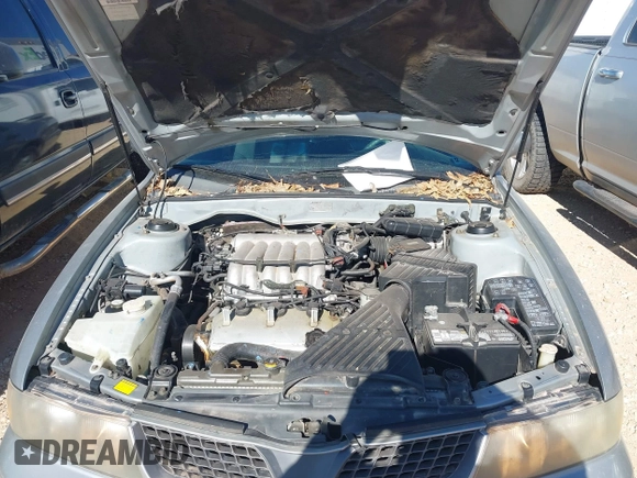 2002 Mitsubishi Diamante z VIN 6MMAP87P82T022689, wystawiony jako IAAI lot #41193483 z przebiegiem 107 022 mil mil oraz . Historia ofert i sprzedaży dostępna na DreamBid. Obrazek 10.