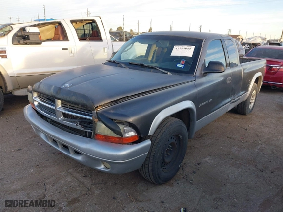 2002 Dodge Dakota SLT with VIN 1B7GL42X42S682184, listed as a IAAI auction lot 41784688 with 168,298 mi miles. Bid and sale history available at carsss.com. Image 2.