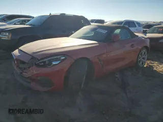 2022 BMW Z4 sDrive30i z VIN WBAHF3C07NWX99131, wystawiony jako Copart lot #83157174 z przebiegiem Nie podano mil oraz Szkody całkowita. Historia ofert i sprzedaży dostępna na DreamBid. Obrazek 1.