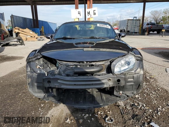 2015 Mazda MX-5 Miata Grand Touring z VIN JM1NC2PF3F0239991, wystawiony jako Copart lot #46989165 z przebiegiem 139 801 mil mil oraz Szkoda całkowita • Salvage title. Historia ofert i sprzedaży dostępna na DreamBid. Obrazek 5.