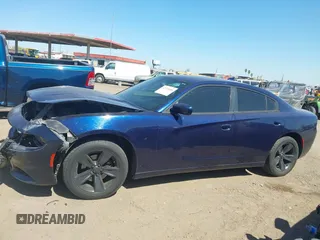 2015 Dodge Charger SXT with VIN 2C3CDXHG5FH789718, listed as a IAAI auction lot 42136480 with 168,633 mi miles and . Bid and sale history available at DreamBid. Image 14.
