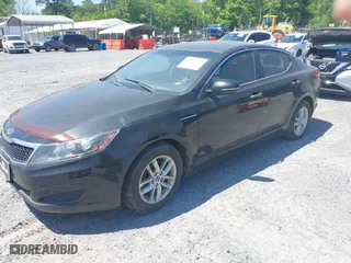 2011 Kia Optima LX with VIN KNAGM4A75B5069596, listed as a IAAI auction lot 42032235 with 93,028 mi miles. Bid and sale history available at carsss.com. Image 2.