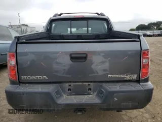 2011 Honda Ridgeline RT z VIN 5FPYK1F26BB451960, wystawiony jako Copart lot #53733215 z przebiegiem 202 556 mil mil oraz Szkody całkowita. Historia ofert i sprzedaży dostępna na DreamBid. Obrazek 6.