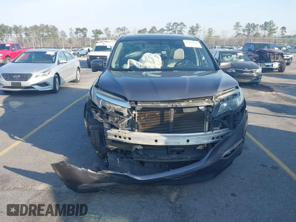 2017 Honda Pilot EX-L with VIN 5FNYF5H58HB011940, listed as a IAAI auction lot 41793151 with 118,088 mi miles. Bid and sale history available at carsss.com. Image 12.