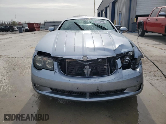 2004 Chrysler Crossfire z VIN 1C3AN69L14X024234, wystawiony jako Copart lot #51322415 z przebiegiem 70 243 mil mil oraz Szkoda całkowita • Salvage title. Historia ofert i sprzedaży dostępna na DreamBid. Obrazek 5.