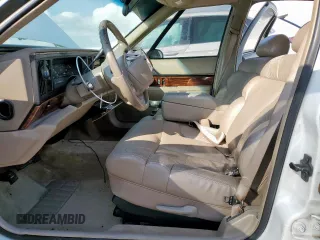 1999 Buick LeSabre Limited z VIN 1G4HR52K1XH501474, wystawiony jako Copart lot #59096715 z przebiegiem 122 857 mil mil oraz Szkoda całkowita • Salvage title. Historia ofert i sprzedaży dostępna na DreamBid. Obrazek 7.