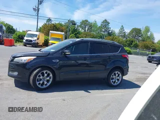 2015 Ford Escape Titanium с VIN 1FMCU0JX5FUB87813, выставлен на аукционе IAAI как лот 42035295 с пробегом 148 430 миль миль и . История ставок и продаж доступна на DreamBid. Изображение 14.