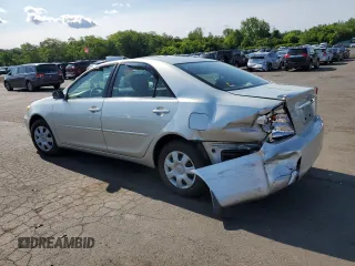2004 Toyota Camry LE z VIN JTDBE32K640270298, wystawiony jako Copart lot #58800955 z przebiegiem 79 064 mil mil oraz Szkoda całkowita • Salvage title. Historia ofert i sprzedaży dostępna na DreamBid. Obrazek 2.