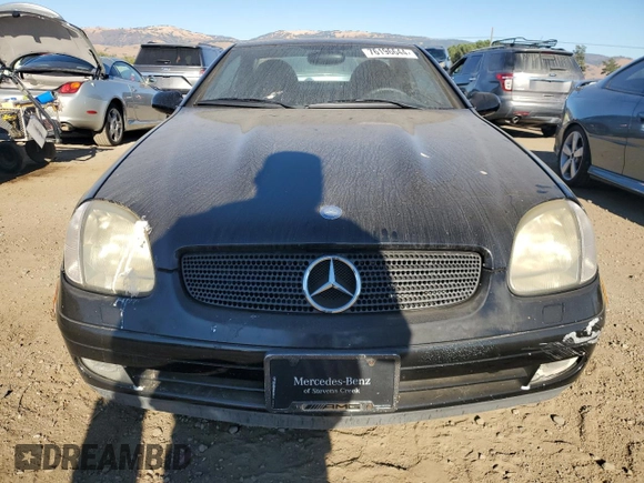 1999 Mercedes-Benz SLK-Class with VIN WDBKK47F2XF102913, listed as a Copart auction lot 76196644 with 112,119 mi miles and Clean Title. Bid and sale history available at carsss.com. Image 5.