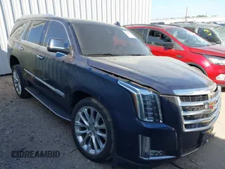 2019 Cadillac Escalade Luxury z VIN 1GYS4BKJ4KR291044, wystawiony jako IAAI lot #41818756 z przebiegiem Nie podano mil oraz . Historia ofert i sprzedaży dostępna na DreamBid. Obrazek 1.