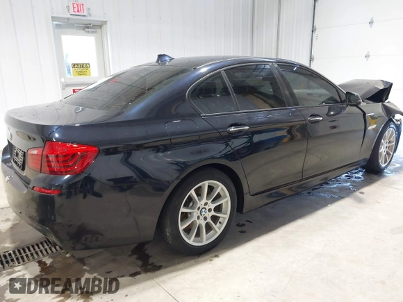 2014 BMW 5 Series 535i xDrive with VIN WBA5B3C58ED531825, listed as a IAAI auction lot 41715275 with 67,782 mi miles and . Bid and sale history available at carsss.com. Image 4.