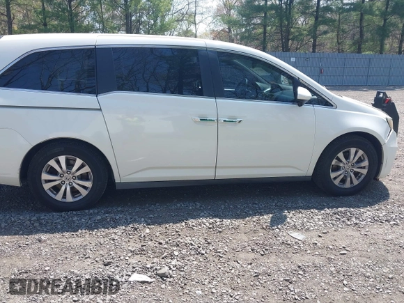 2015 Honda Odyssey EX-L with VIN 5FNRL5H64FB069742, listed as a IAAI auction lot 42101807 with 152,611 mi miles and . Bid and sale history available at DreamBid. Image 13.