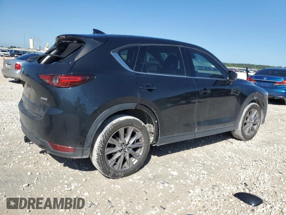 2019 Mazda CX-5 Grand Touring with VIN JM3KFBDM7K0563198, listed as a Copart auction lot 54723494 with 132,126 mi miles and Clean Title. Bid and sale history available at carsss.com. Image 3.