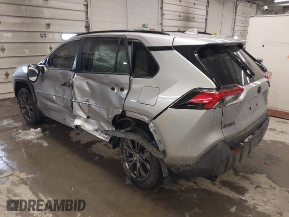 2024 Toyota RAV4 Hybrid XLE Premium with VIN JTMB6RFV5RD148973, listed as a IAAI auction lot 41516422 with 8,797 mi miles. Bid and sale history available at carsss.com. Image 3.