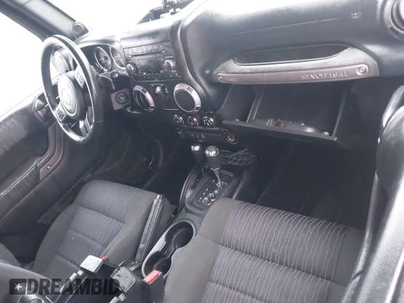 2012 Jeep Wrangler Sport z VIN 1C4AJWAG8CL262755, wystawiony jako IAAI lot #41566823 z przebiegiem 164 135 mil mil oraz . Historia ofert i sprzedaży dostępna na DreamBid. Obrazek 5.