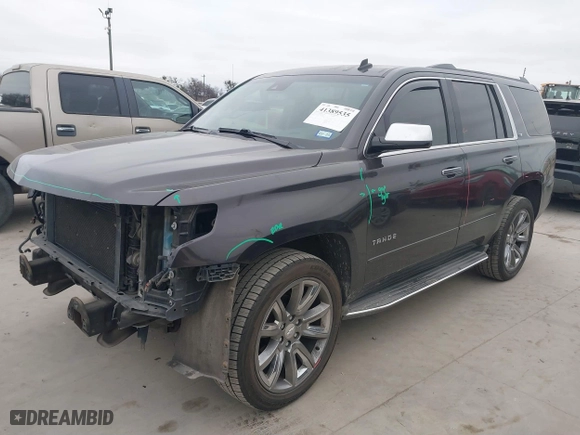 2015 Chevrolet Tahoe LTZ with VIN 1GNSCCKC6FR262769, listed as a IAAI auction lot 41389535 with 196,767 mi miles. Bid and sale history available at carsss.com. Image 2.