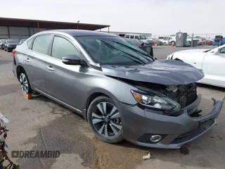 2019 Nissan Sentra S z VIN 3N1AB7AP1KY450626, wystawiony jako IAAI lot #41579237 z przebiegiem 60 458 mil mil oraz . Historia ofert i sprzedaży dostępna na DreamBid. Obrazek 1.