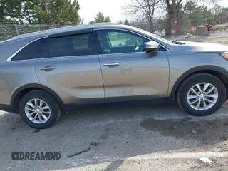 2017 Kia Sorento LX with VIN 5XYPG4A3XHG297598, listed as a IAAI auction lot 42029607 with 104,157 mi miles. Bid and sale history available at carsss.com. Image 13.