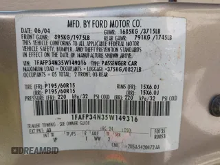 2005 Ford Focus S with VIN 1FAFP34N35W149316, listed as a IAAI auction lot 41699144 with 133,372 mi miles. Bid and sale history available at carsss.com. Image 9.