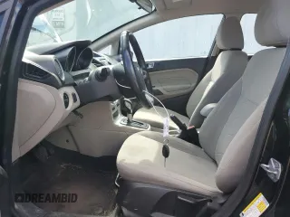 2014 Ford Fiesta SE z VIN 3FADP4EJ5EM182407, wystawiony jako Copart lot #51848425 z przebiegiem 134 347 mil mil oraz Szkoda całkowita • Salvage title. Historia ofert i sprzedaży dostępna na DreamBid. Obrazek 7.