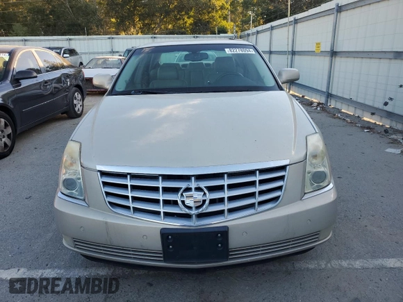 2007 Cadillac DTS V8 z VIN 1G6KD57Y77U125427, wystawiony jako Copart lot #82278094 z przebiegiem 117 812 mil mil oraz Czysty tytuł • Clean title. Historia ofert i sprzedaży dostępna na DreamBid. Obrazek 5.