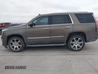 2015 Cadillac Escalade Luxury z VIN 1GYS3MKJ9FR725818, wystawiony jako IAAI lot #41596731 z przebiegiem 224 246 mil mil oraz . Historia ofert i sprzedaży dostępna na DreamBid. Obrazek 14.