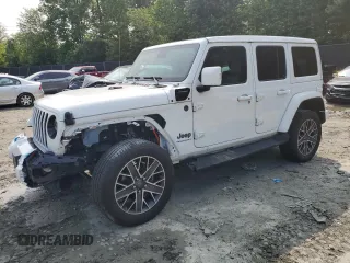 2023 Jeep Wrangler Sahara z VIN 1C4JJXP67PW514844, wystawiony jako Copart lot #52703895 z przebiegiem 26 049 mil mil oraz Szkoda całkowita • Salvage title. Historia ofert i sprzedaży dostępna na DreamBid. Obrazek 1.