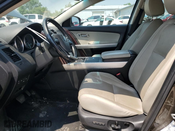 2015 Mazda CX-9 Grand Touring with VIN JM3TB2DA9F0468539, listed as a Copart auction lot 60829905 with 223,483 mi miles and Clean title. Bid and sale history available at DreamBid. Image 7.