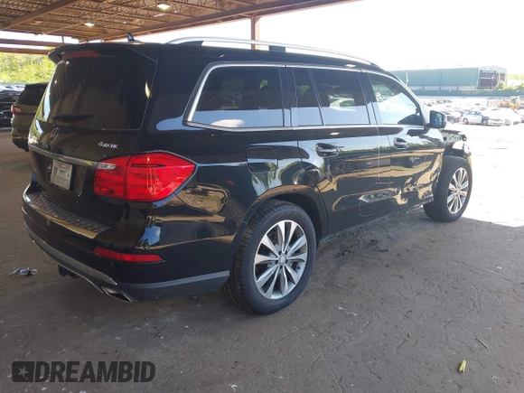 2014 Mercedes-Benz GL 450 z VIN 4JGDF7CE7EA395551, wystawiony jako IAAI lot #42247332 z przebiegiem 105 636 mil mil oraz . Historia ofert i sprzedaży dostępna na DreamBid. Obrazek 4.