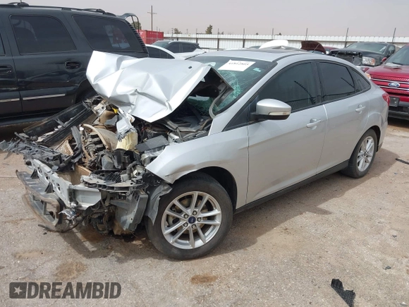 2016 Ford Focus SE with VIN 1FADP3F20GL338536, listed as a IAAI auction lot 41812805 with 130,943 mi miles. Bid and sale history available at carsss.com. Image 2.