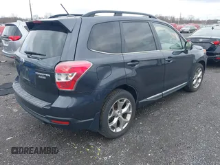 2015 Subaru Forester Touring with VIN JF2SJAWC0FH585722, listed as a IAAI auction lot 41734016 with 90,728 mi miles and . Bid and sale history available at DreamBid. Image 4.